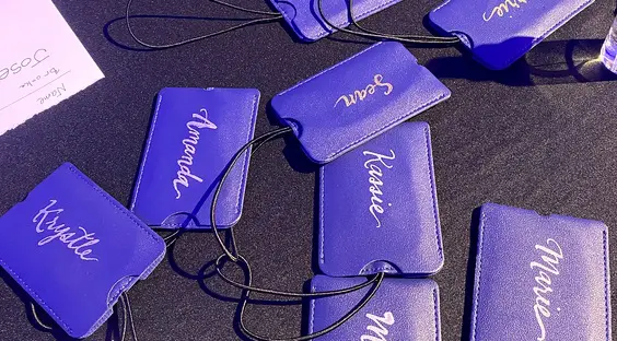 Luggage tags personalized with live calligraphy
