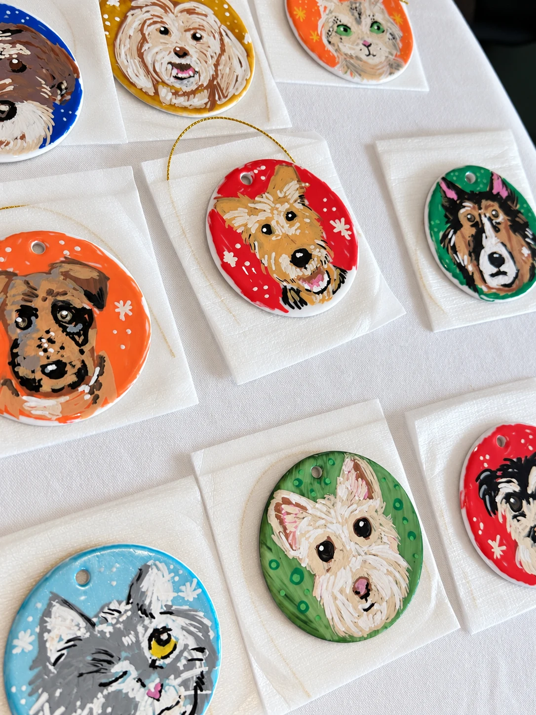 Hand-painted dog and cat portraits on keepsake ornaments