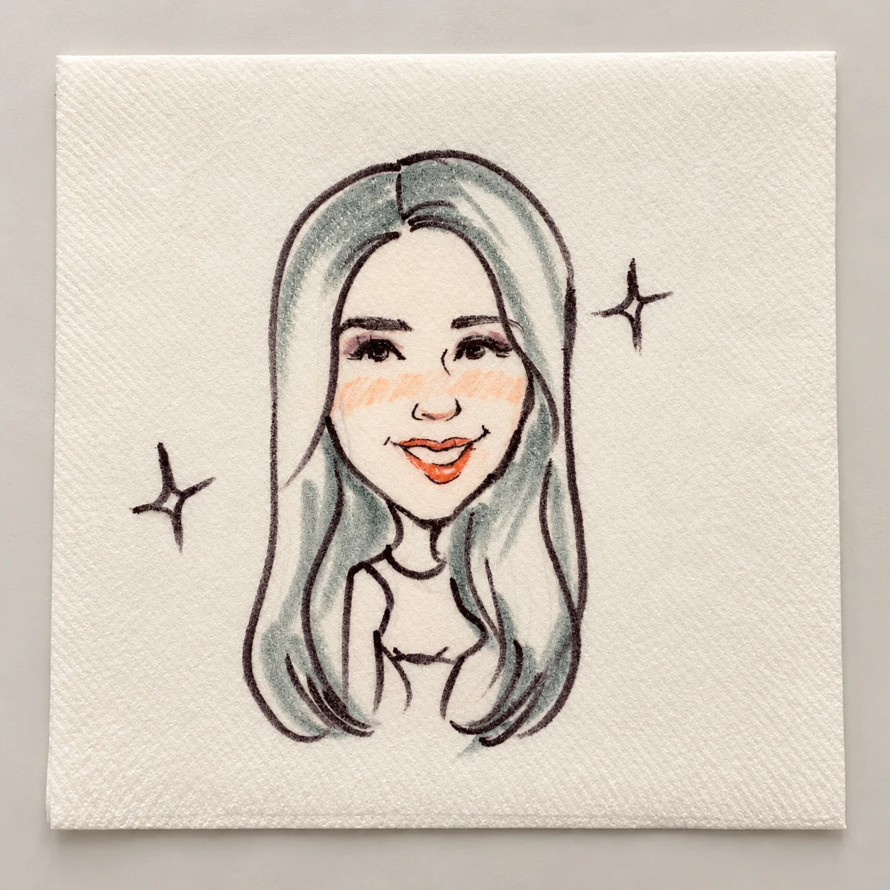 Black-and-white woman’s portrait on a cocktail napkin